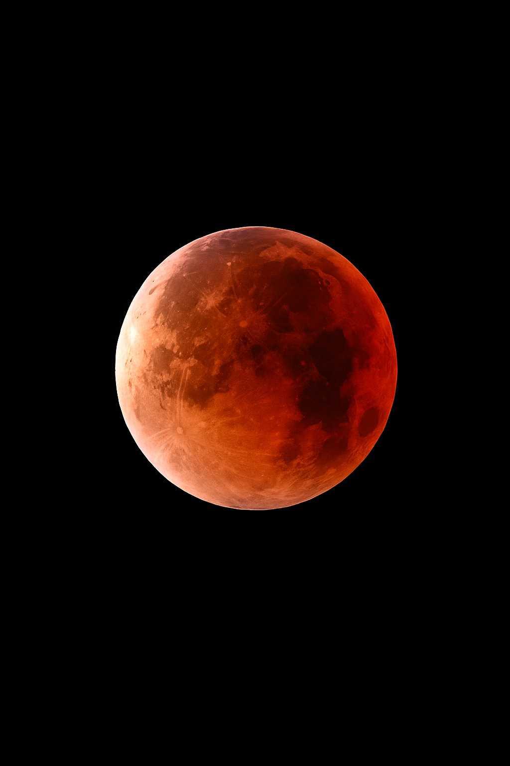 The Moon over Mustika Jaya, Indonesia — full moon, Lunar Day 16