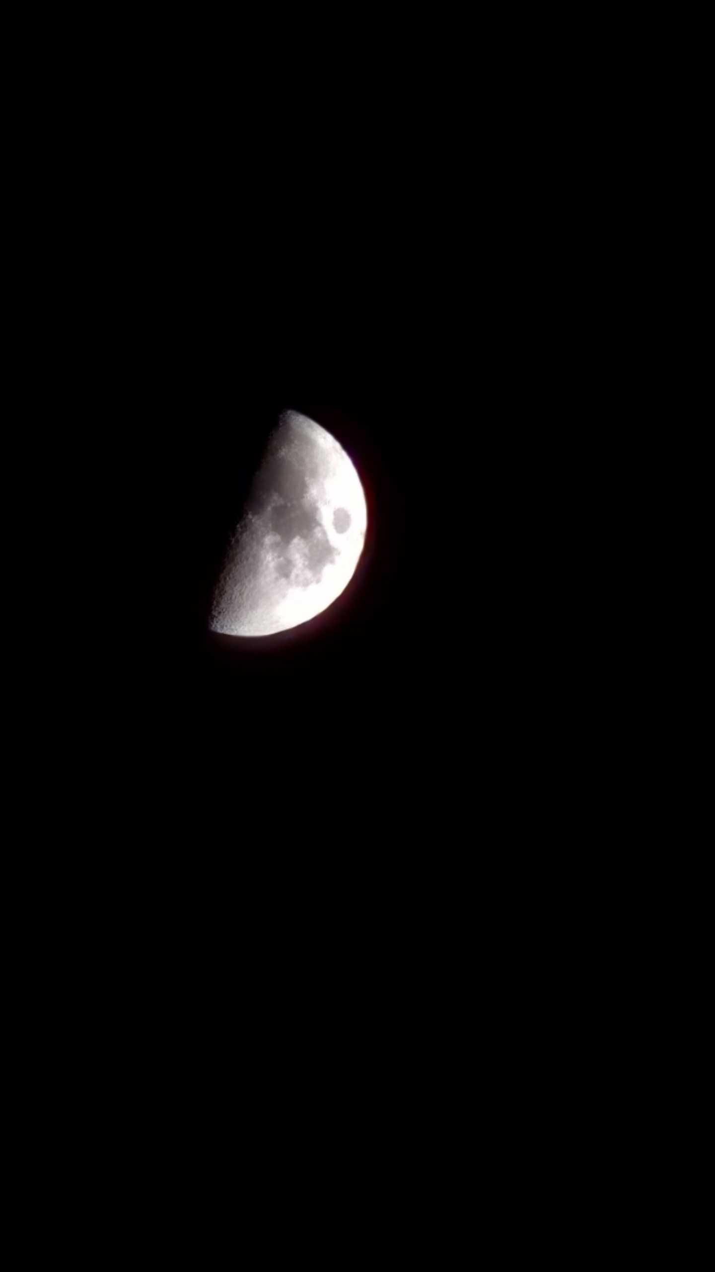 The Moon over Servian, France — first quarter, Lunar Day 8