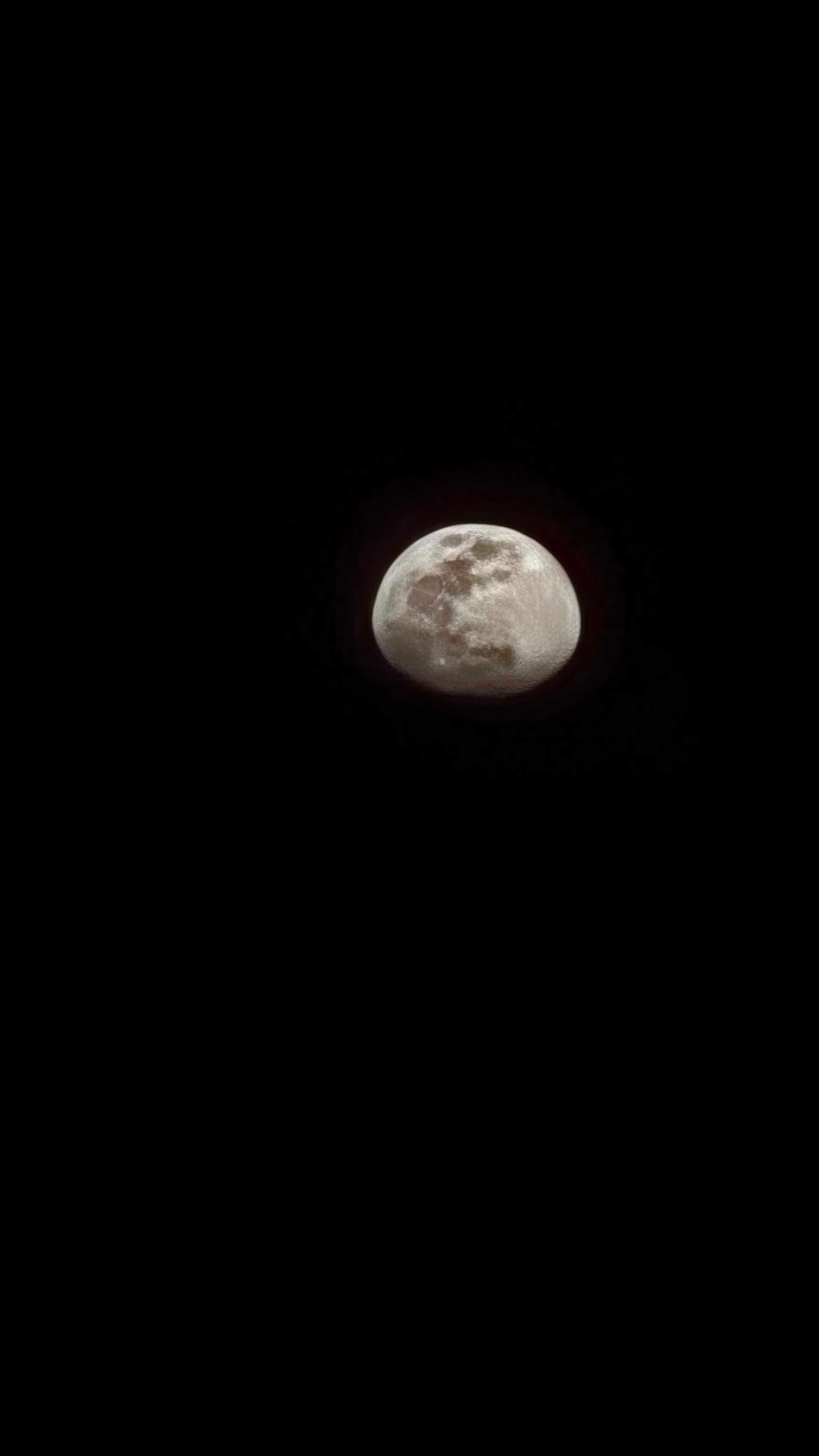 The Moon over Uttar Madarihat, India — waxing gibbous, Lunar Day 12