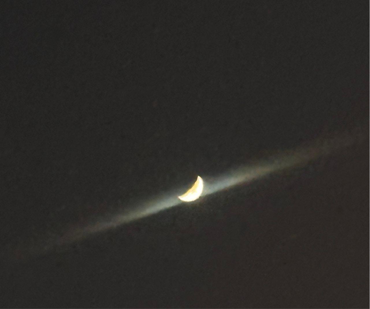 The Moon over Gianyar, Indonesia — first quarter, Lunar Day 8