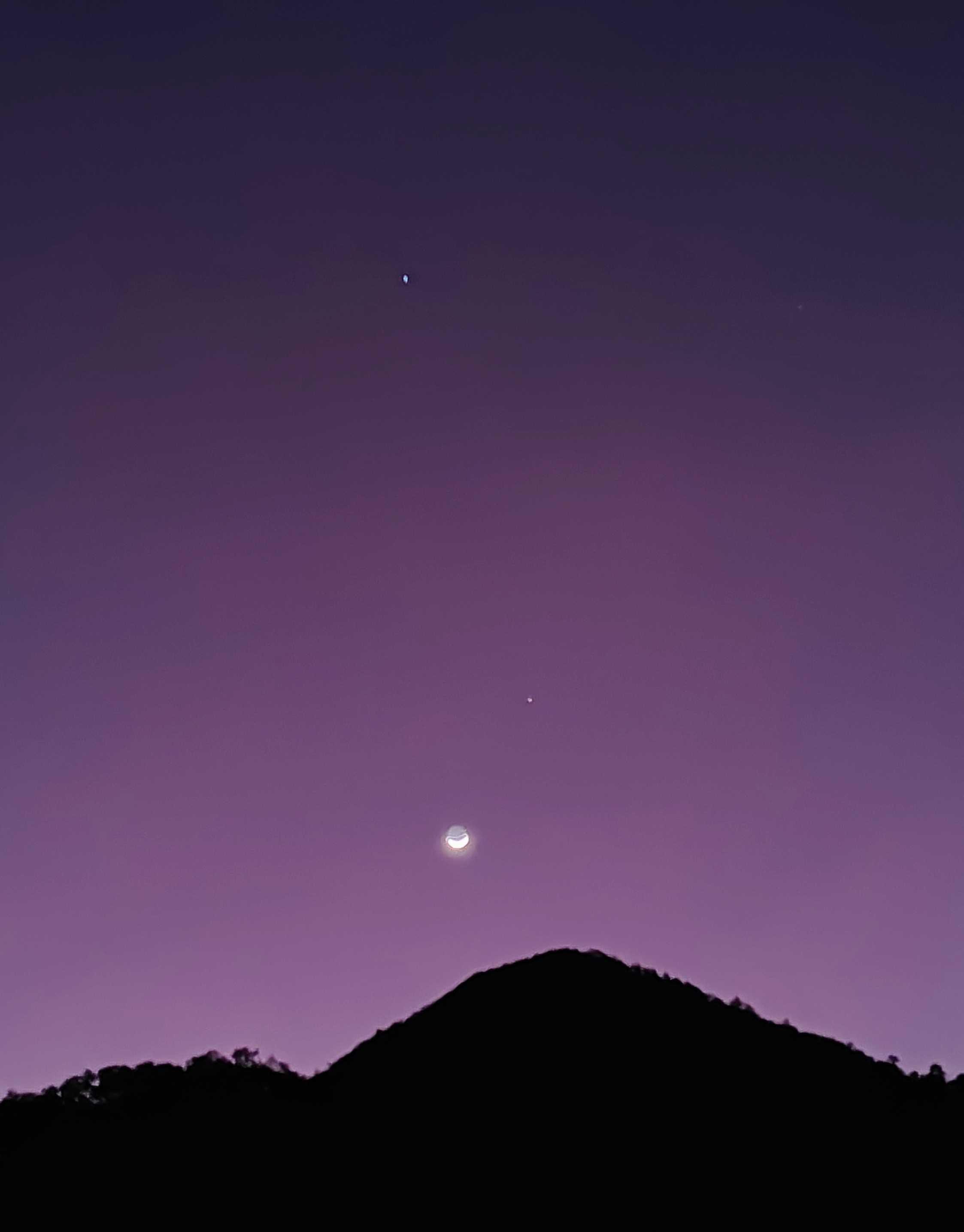 The Moon over Mount Sheridan, Australia — waxing crescent, Lunar Day 3