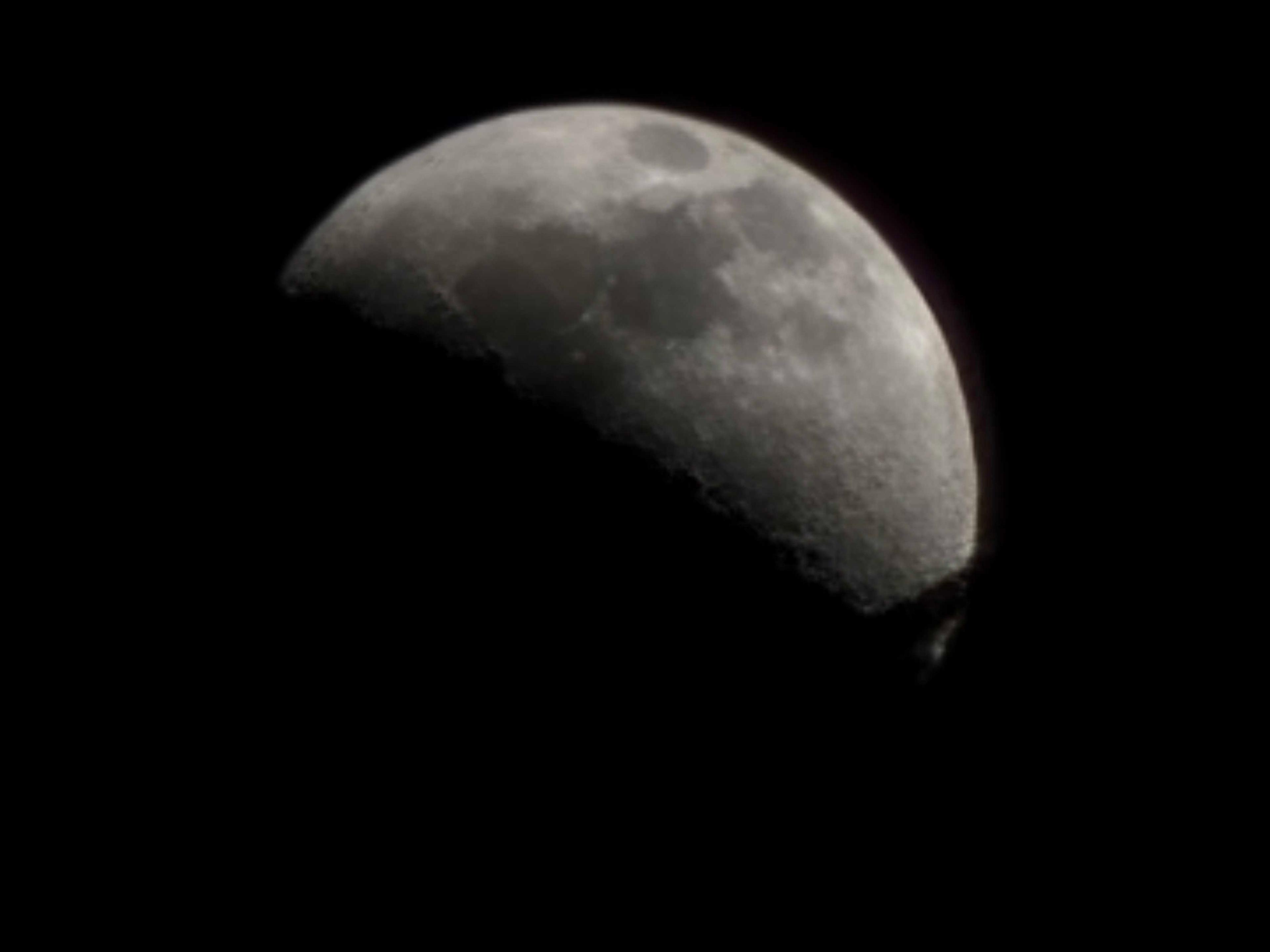 The Moon over Cambois, United Kingdom — first quarter, Lunar Day 9