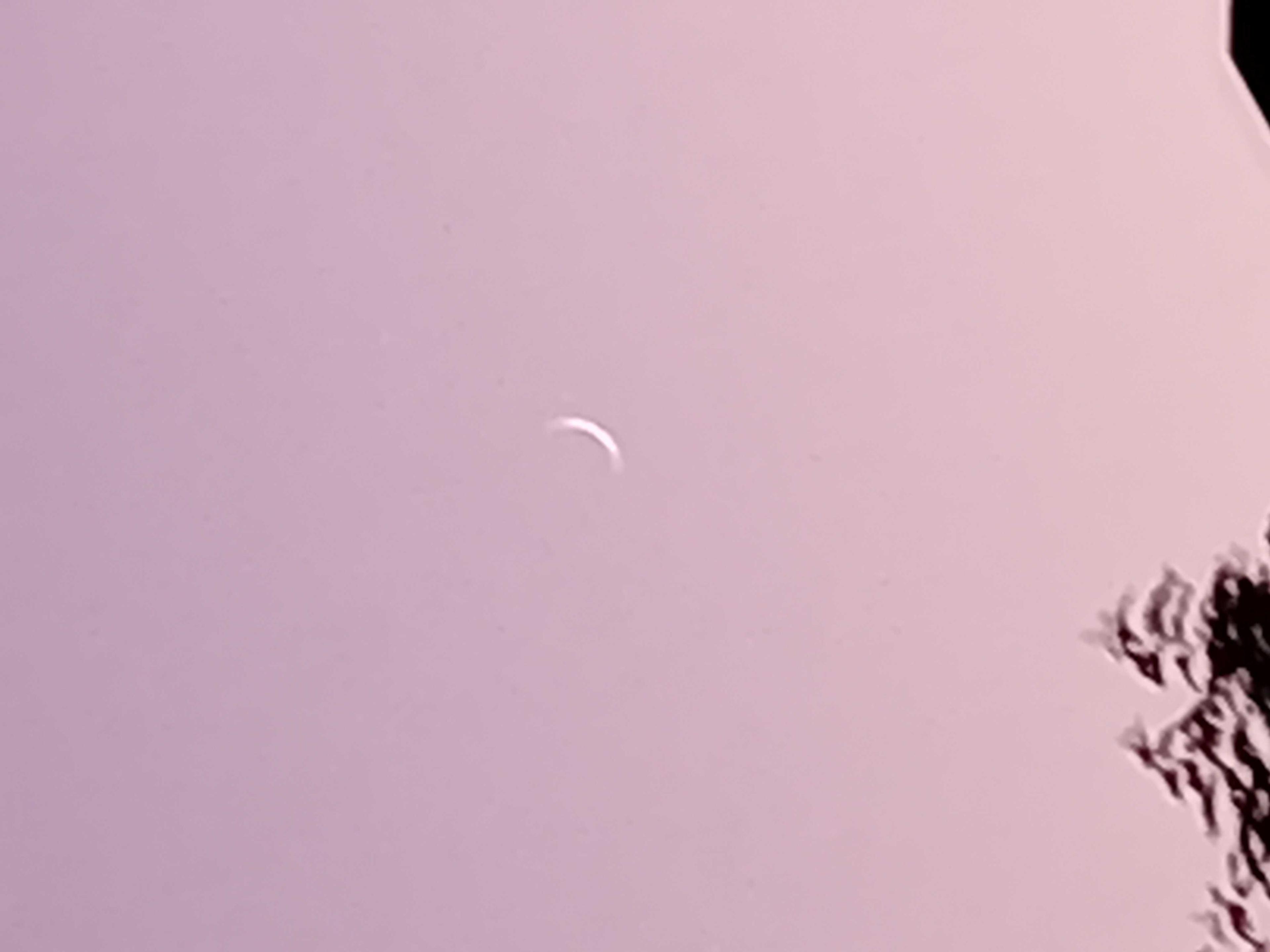 The Moon over Rho, Italia — new moon, Lunar Day 2