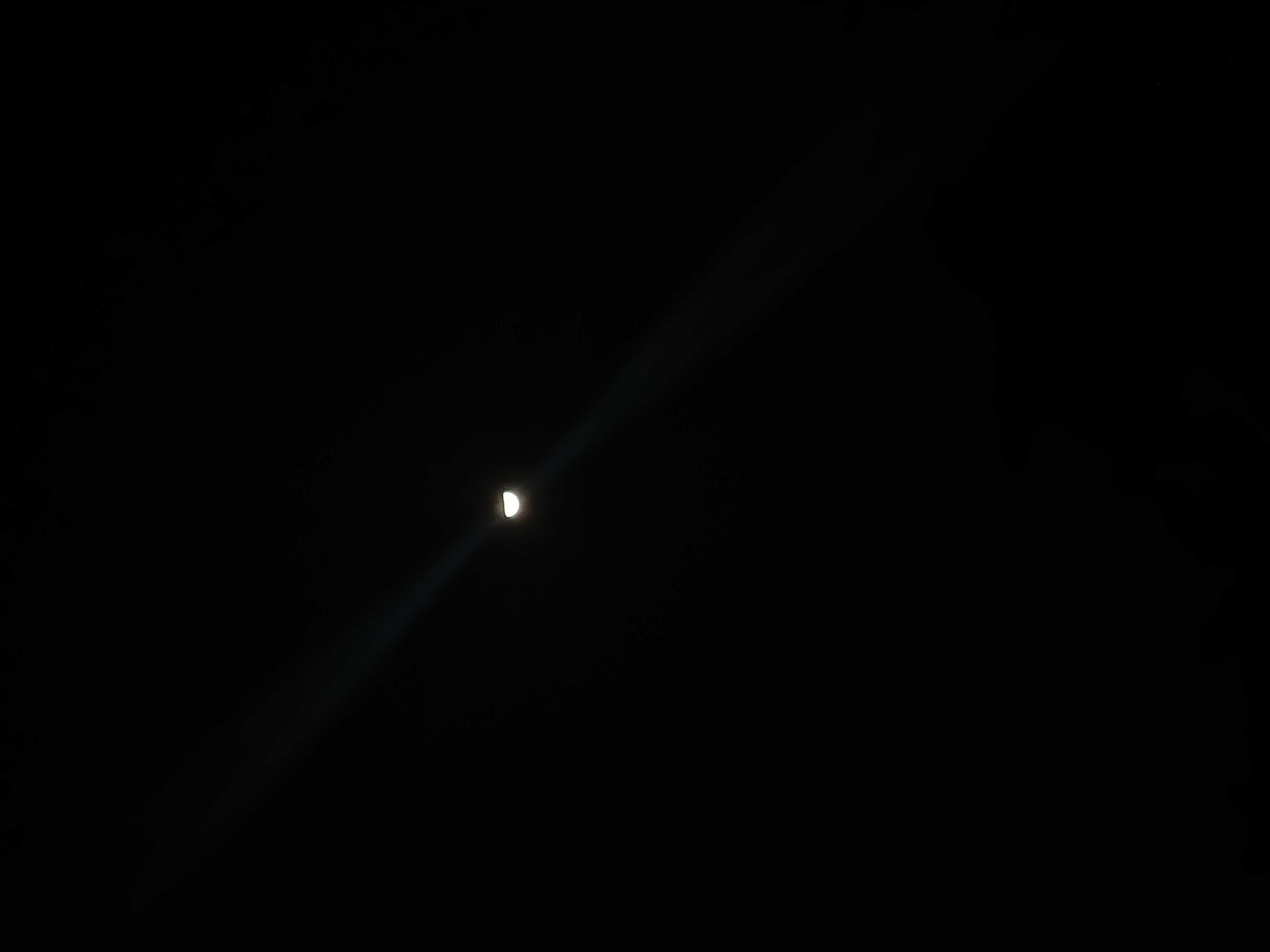 The Moon over Bogotá, Colombia — first quarter, Lunar Day 9