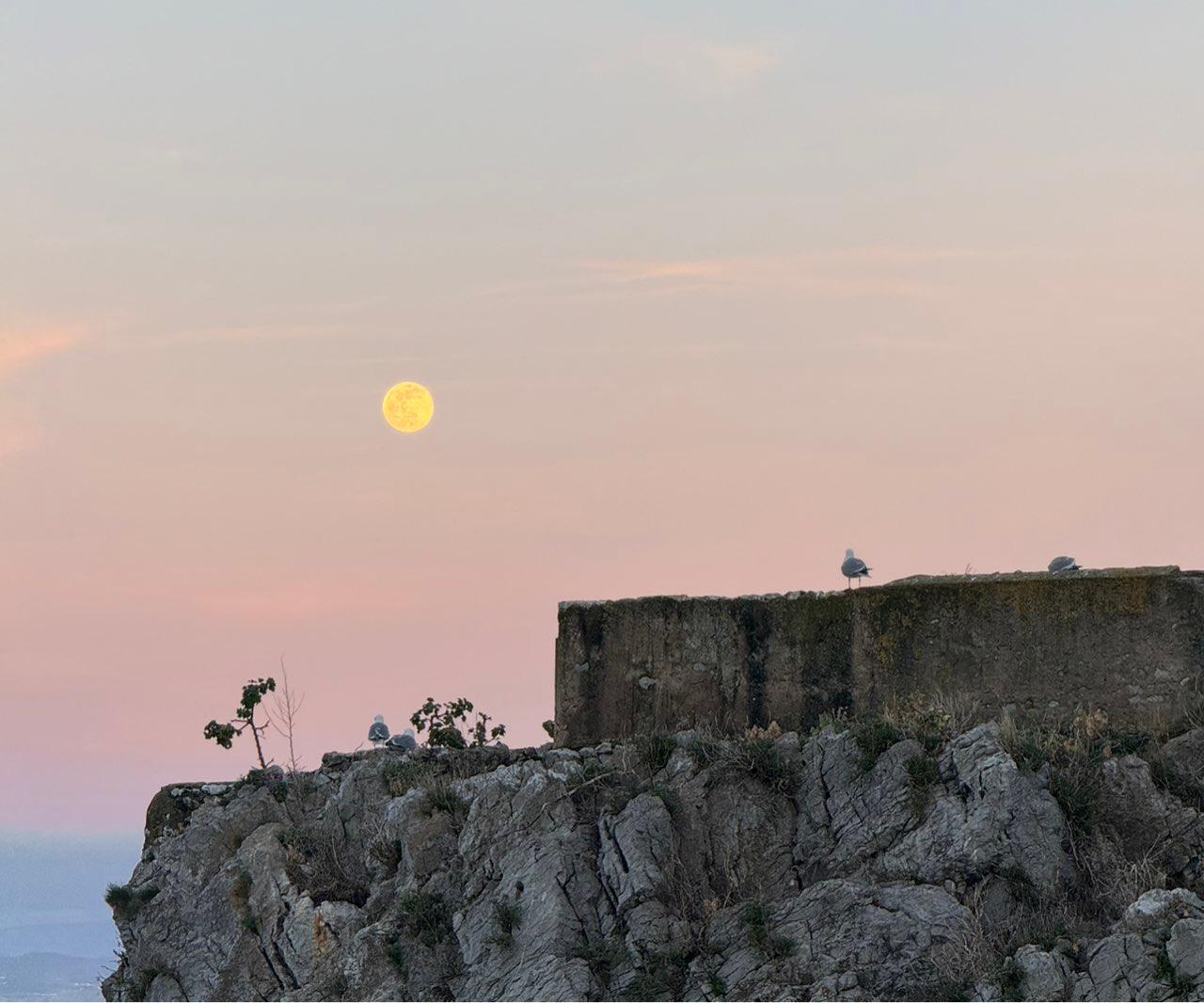 The Moon over Castro-Urdiales, España — full moon, Lunar Day 15