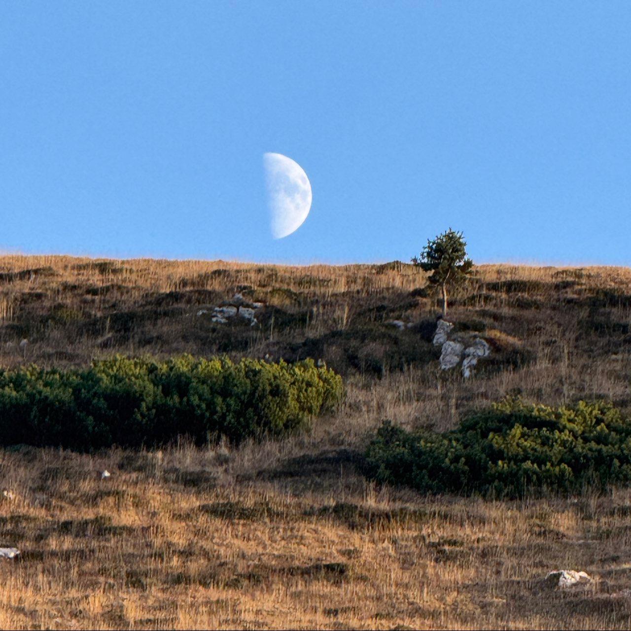 The Moon over Nago-Torbole, Italy — first quarter, Lunar Day 9