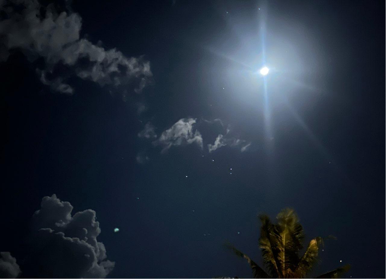 The Moon over Gianyar, Indonesia — first quarter, Lunar Day 10