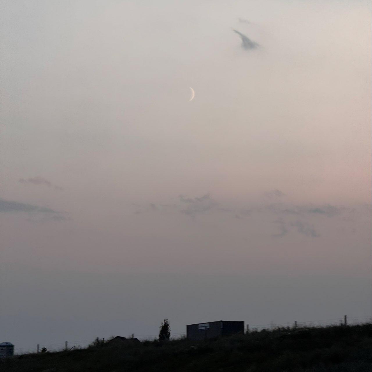 The Moon over Calgary, Canada — waxing crescent, Lunar Day 5