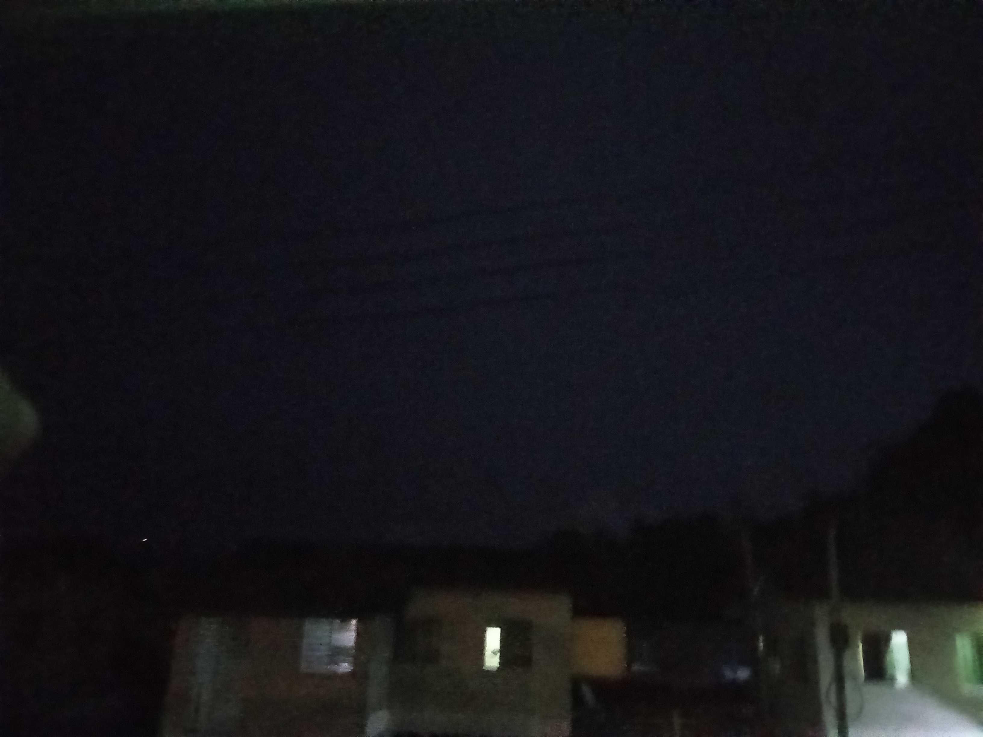 The Moon over Kota Kinabalu, Malaysia — full moon, Lunar Day 16