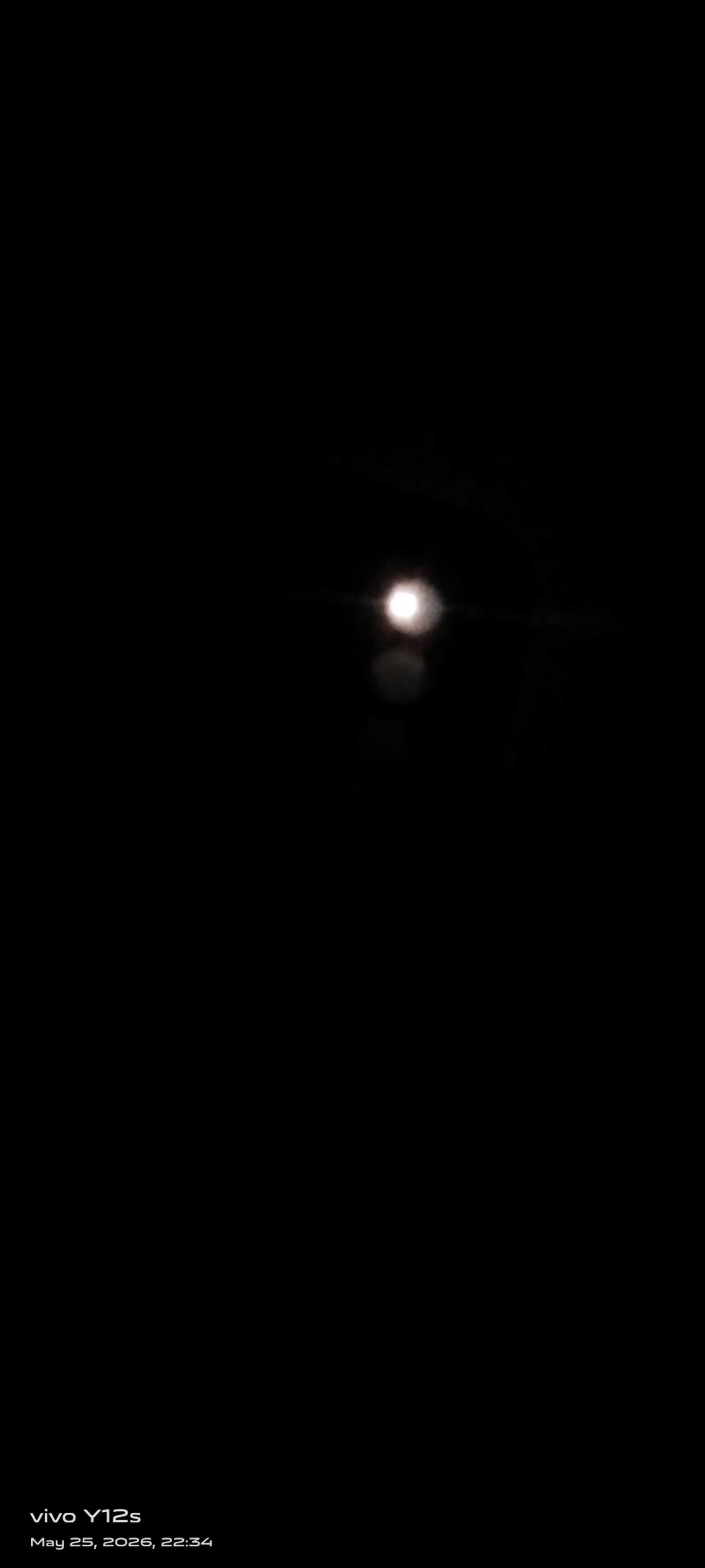 The Moon over Jetholi, India — waxing gibbous, Lunar Day 10