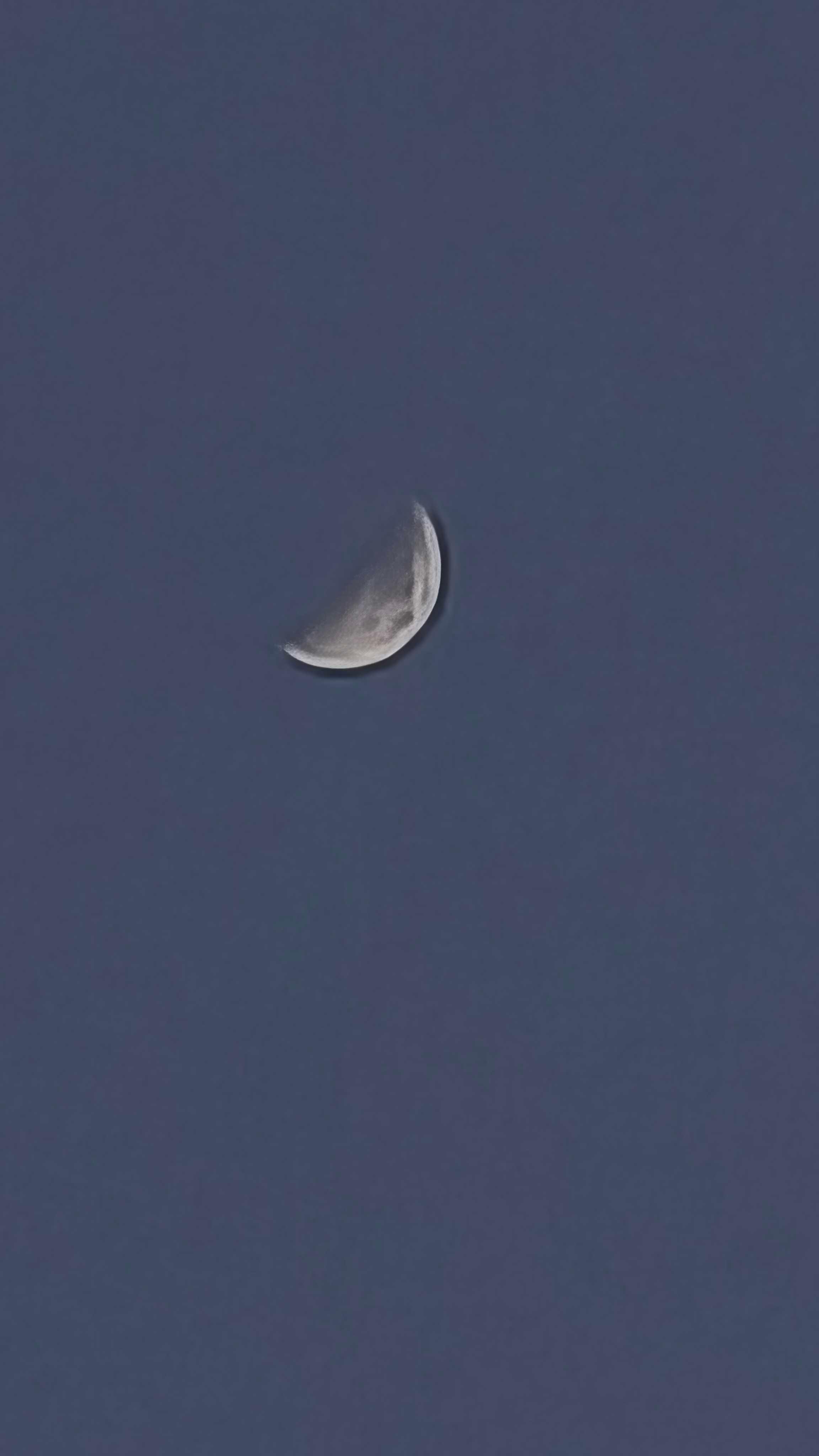 The Moon over Purba Khairbari, India — first quarter, Lunar Day 8