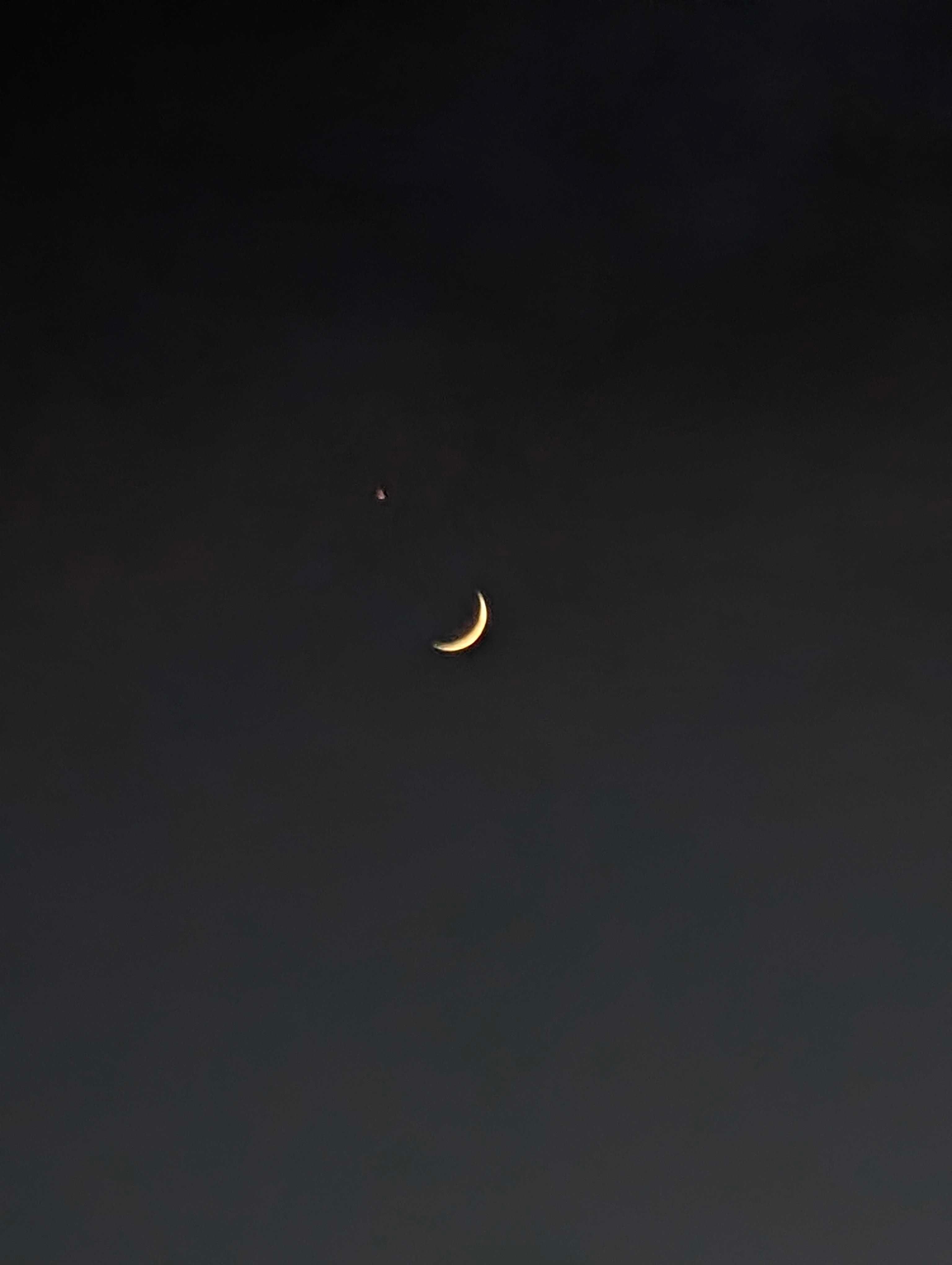 The Moon over Platges de Fornells, España — waxing crescent, Lunar Day 4