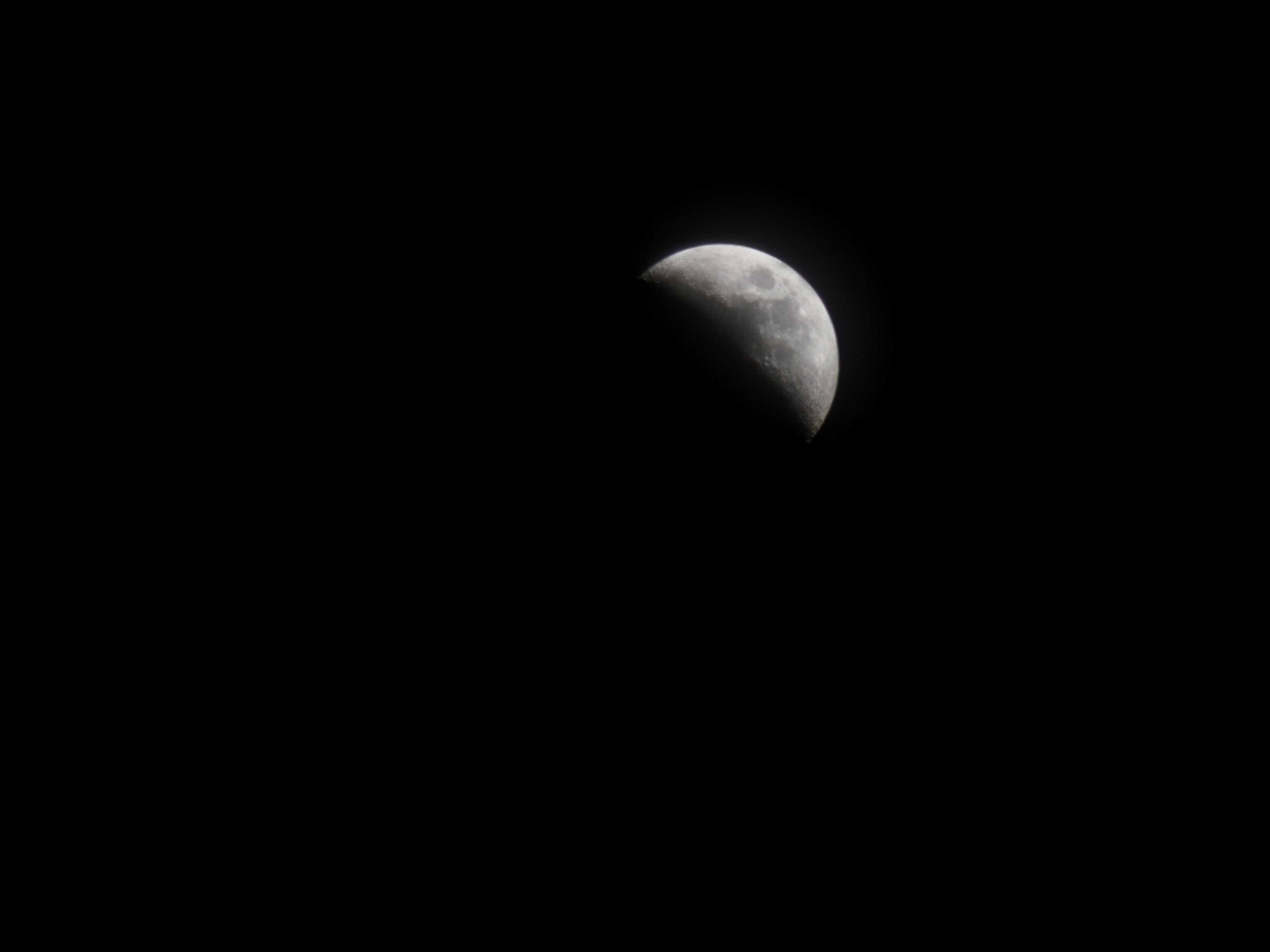 The Moon over Portmore, Jamaica — first quarter, Lunar Day 7