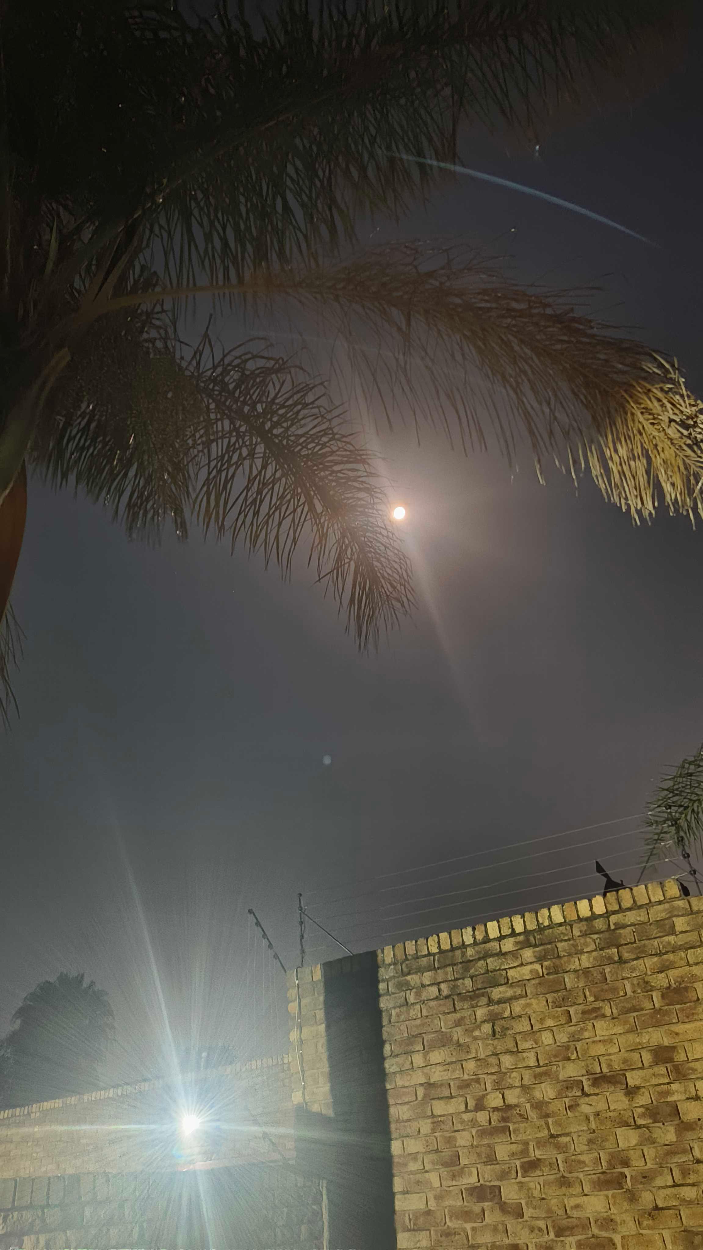 The Moon over Kempton Park, South Africa — full moon, Lunar Day 16