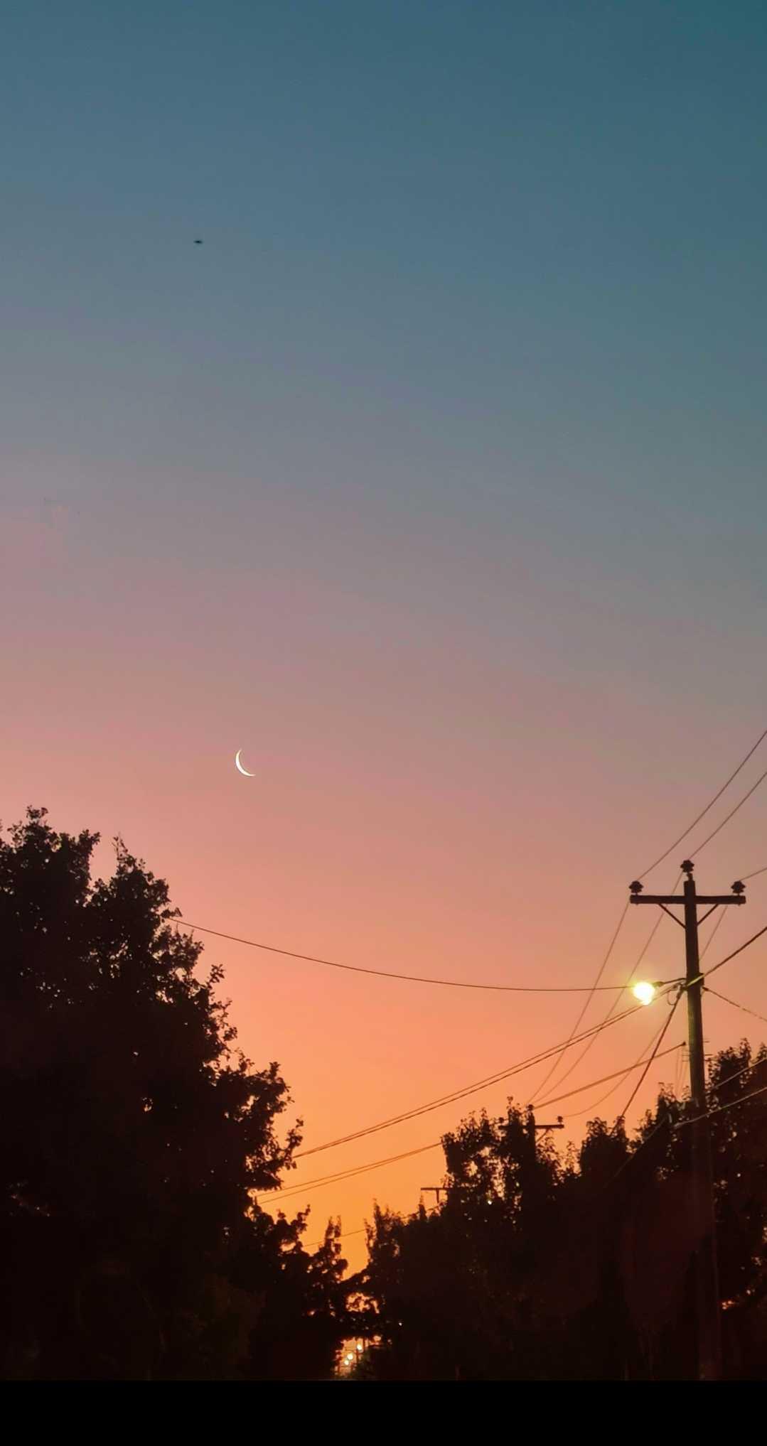 The Moon over Sydney, Australia — new moon, Lunar Day 2