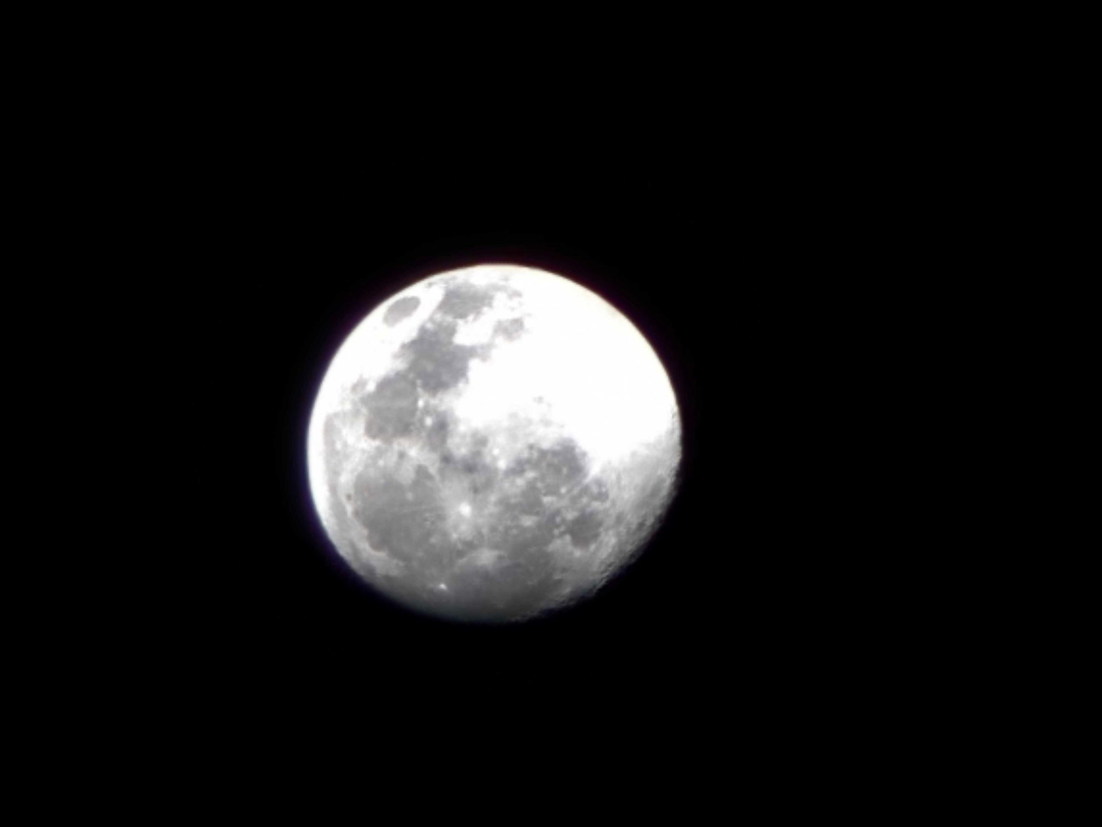 The Moon over Washington, United States — waxing gibbous, Lunar Day 14